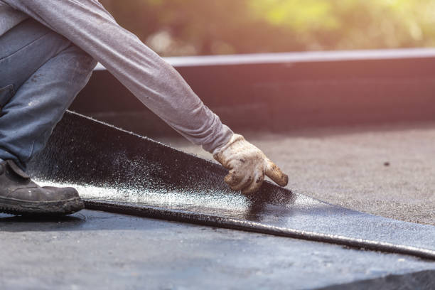 Professional Basement Waterproofing technician working in Oroville, WA